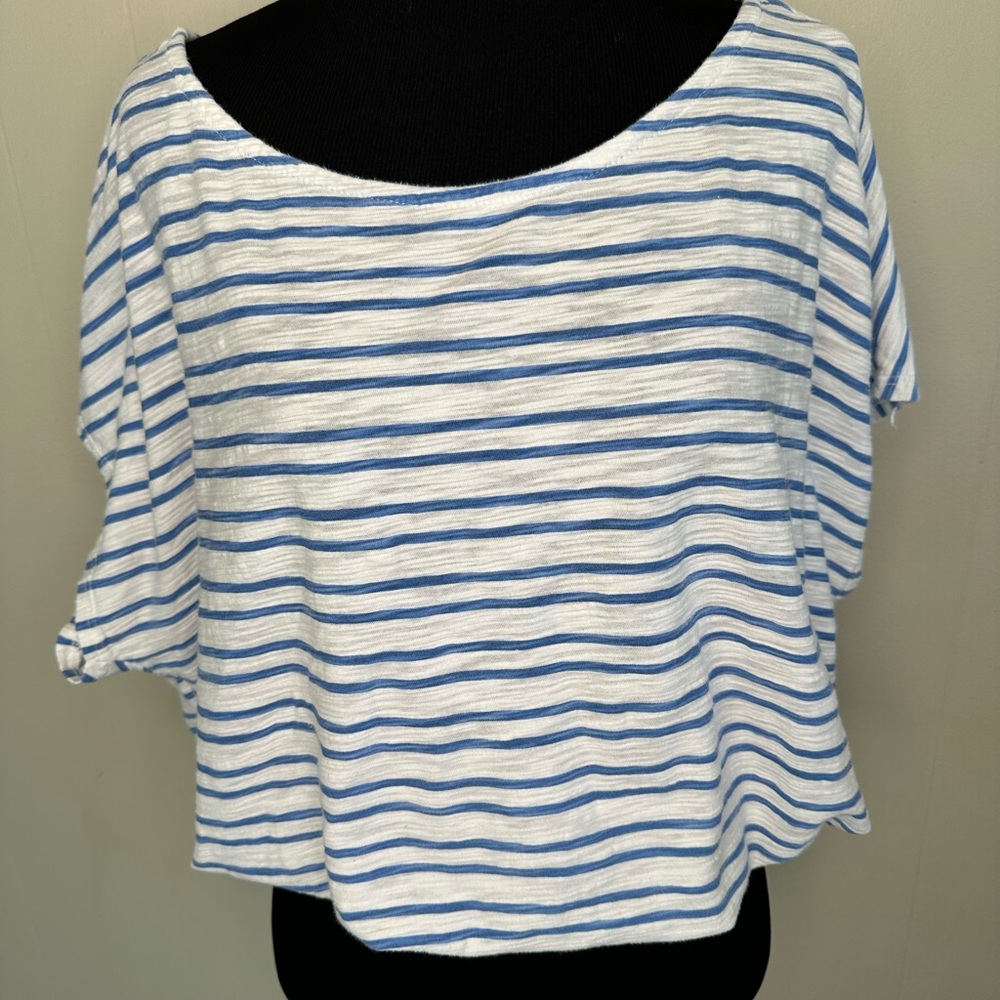 White and blue women’s shirt. Tag says size 14 but fits like a medium.